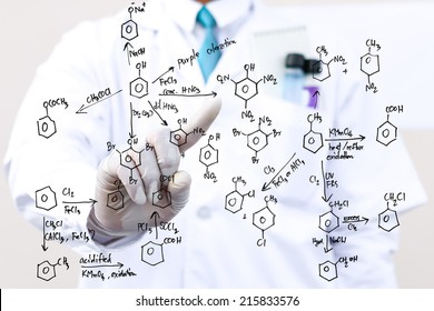 Male Scientist Is Drawing Chemical Reaction On Virtual Screen Concept For Chemical Analyzing.