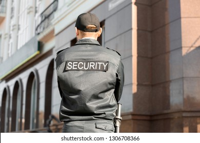 Male Security Guard Outdoors Back View Stock Photo 1306708366 ...