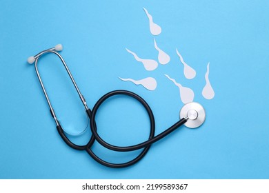 Male Sexual Health. Analysis Of The Causes Of Infertility. Stethoscope With Male Semen(spermatozoa) On A Blue Background