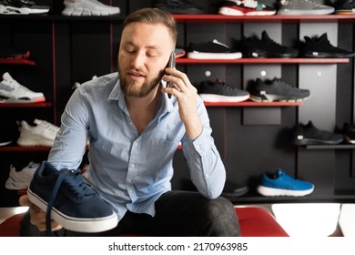 Male Shoe Store Owner Talking On Stock Photo 2170963985 | Shutterstock