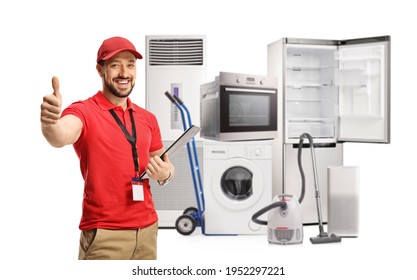 Male Shop Assistant With Electircal Home Appliances Gesturing A Thumb Up Sign Isolated On White Background