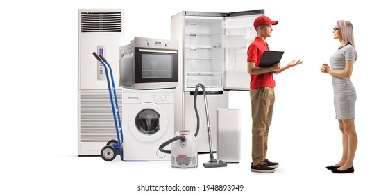 Male Shop Assistant Explaining About Home Appliances To A Female Customer Isolated On White Background