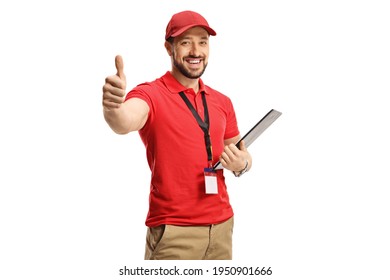 Male shop assistant gesturing a thumb up sign isolated on white background