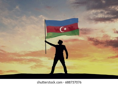 Male Silhouette Figure Waving Azerbaijan Flag. 3D Rendering