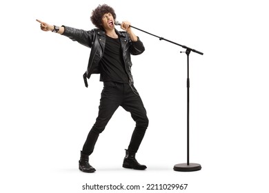 Male singer in a leather jacket singing loud on a microphone isolated on white background - Powered by Shutterstock