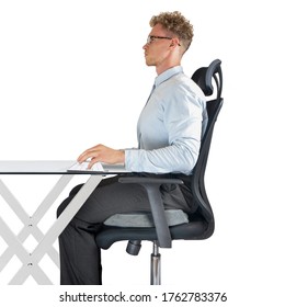 Male Sitting On Office Chair At Desk With Good Posture And Support