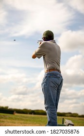 Male Skeet Shooter With Shotgun