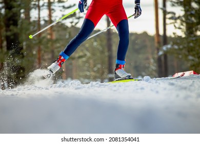 male skier athlete goes uphill on cross-country skiing