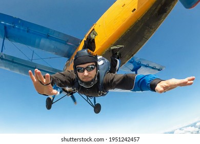 Male skydiver jumps from the aircraft