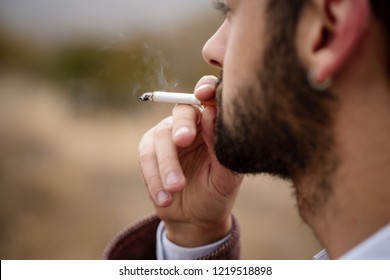 Male Smoking A Cigarette