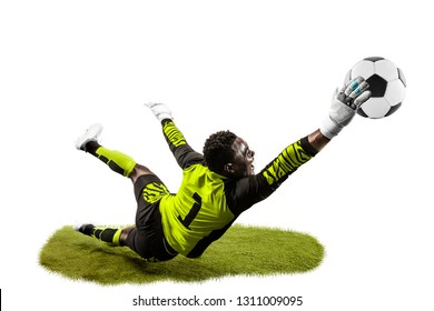 Male soccer player goalkeeper catching ball in jump. Silhouette of fit man with ball isolated on white studio background - Powered by Shutterstock