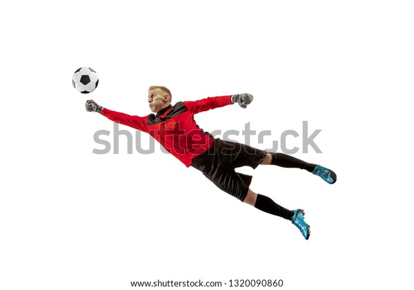 ジャンプでボールを捕まえる男性サッカー選手 白いスタジオ背景にフィットした男性のシルエットとボール の写真素材 今すぐ編集