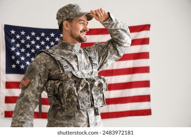 Male soldier against USA flag on light background. Labour Day celebration - Powered by Shutterstock