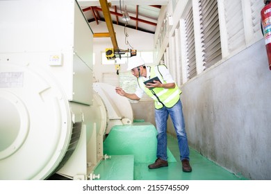 Male Specialist Engineer in High Visibility Vests Using Tablet Computer.  - Powered by Shutterstock