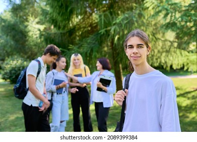 Male Student 16, 17 Years Old With Backpack, In School Park