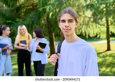 Male Student 16, 17 Years Old With Backpack, In School Park