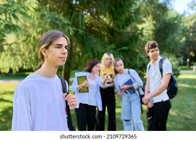 Male Student 16, 17 Years Old With Backpack, In School Park