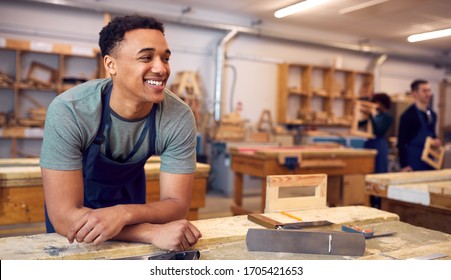 Male Student Studying For Carpentry Apprenticeship At College - Shutterstock ID 1705421653