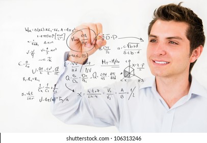 Male student writing math formulasÃ¢Â?Â? education portrait - Powered by Shutterstock