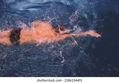 Male Swimmer At The Swimming Pool. Underwater Photo. Male Swimmer.