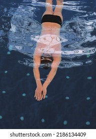 Male Swimmer At The Swimming Pool. Underwater Photo. Male Swimmer.