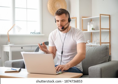 Male Technical Support Agent Working At Home