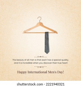 Male tie hanging on the rack,
				Happy international mens day