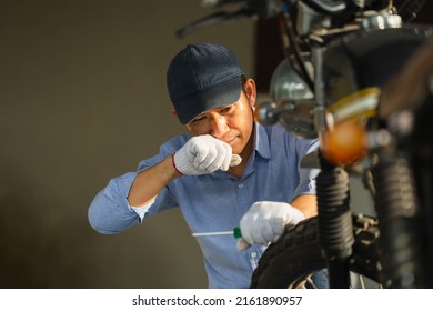 Male Tired Working In Repair Shop, Wiping Off Sweat After Working, Mechanic Repairing Motorcycle, Man Repair Motorbike In Garage, Mechanic Fixing Motorcycle Engine