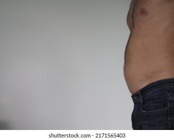  Male Torso Against Plain Background 