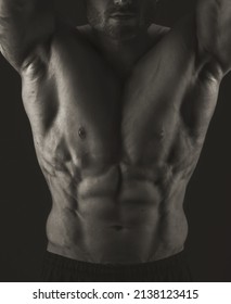 Male Torso. Close-up Of Chest And Abs Muscles. Black And White Photo. Banner Poster.