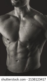 Male Torso. Close-up Of Chest And Abs Muscles. Black And White Photo. Banner Poster.