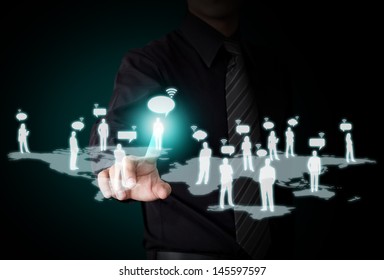  Male touching virtual icon of social network - Shutterstock ID 145597597