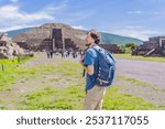 Male tourist exploring Teotihuacan, Mexico. Cultural heritage, ancient ruins, and archaeological adventure concept