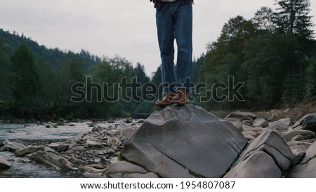 Similar – Image, Stock Photo Young hiker in river landscape