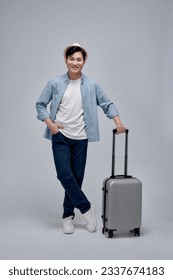 Male tourist with suitcase walking going on vacation advertising travel offer