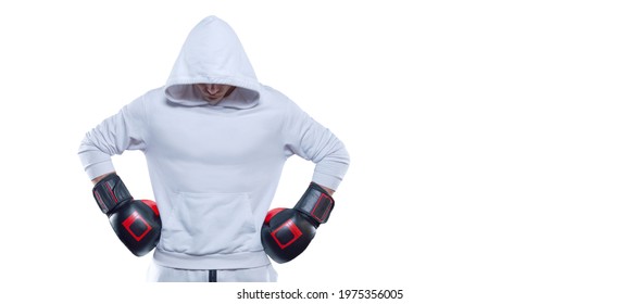 Male trainer posing in the studio with boxing gloves. White hoodie. Mixed martial arts concept. High image quality - Powered by Shutterstock