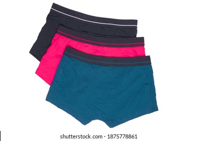 Male Underwear Isolated. Close-up Of Three Casual Boxer Shorts Isolated On A White Background. Clipping Path Included. Fashionable Mens Underpants. Back View.