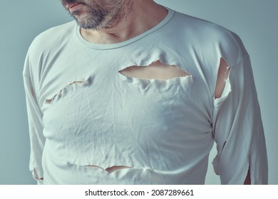 Male Victim Of Domestic Violence And Abuse, Conceptual Image Of Adult Man With Torn Shirt, Selective Focus