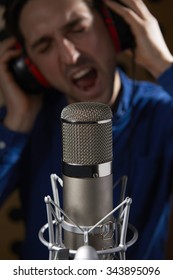 Male Vocalist In Recording Studio