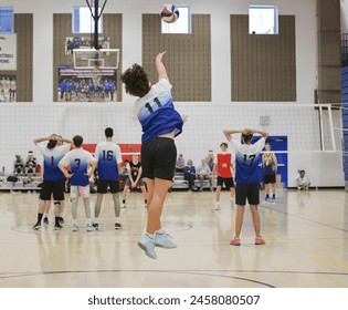 Male volleyball player jump serving - Powered by Shutterstock