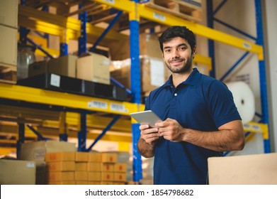 Male warehouse worker portrait in warehouse storage - Shutterstock ID 1854798682