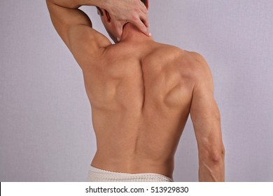 Male Waxing. Muscular Male Back, Torso, Chest And Armpit Hair Removal.