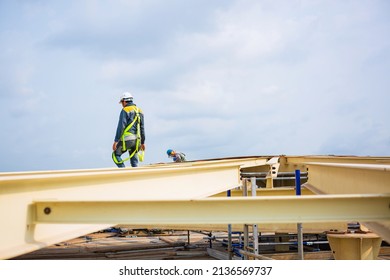 Male Worker Inspection Safety First Harness And Safety Lone Working At High Beam Tank Roof Oil Industry.