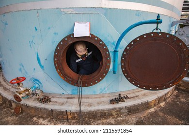 Male Worker Into The Tank Carbon Chemical Oil Interface Area Confined Space Safety.