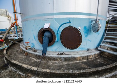 Male Worker Into The Tank Carbon Chemical Oil Interface Area Confined Space Safety.