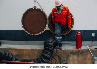 Male Worker Into The Tank Carbon Chemical Oil Interface Area Confined Space Safety.