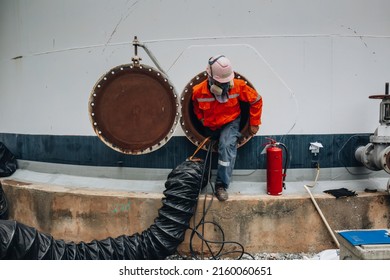 Male Worker Into The Tank Carbon Chemical Oil Interface Area Confined Space Safety.