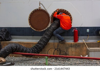 Male Worker Into The Tank Carbon Chemical Oil Interface Area Confined Space Safety.