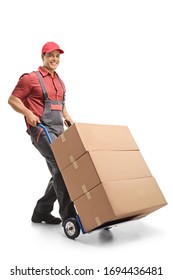 Male Worker Pushing A Hand Truck Loaded With Boxes Isolated On White Background