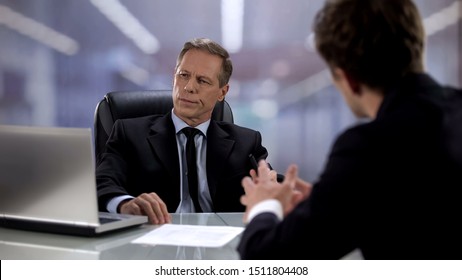 Male Worker Talking To Arrogant Boss Ignoring Him, Opinion Indifference At Work